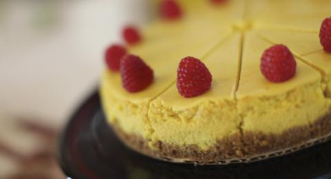 New York Style Cheesecake with raspberries on top
