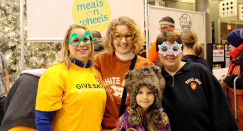Meals on Wheels volunteers with fun glasses