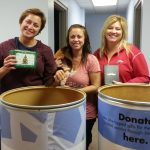 Donors fill Gifts for Seniors barrels with gifts to brighten the holiday season for local seniors.