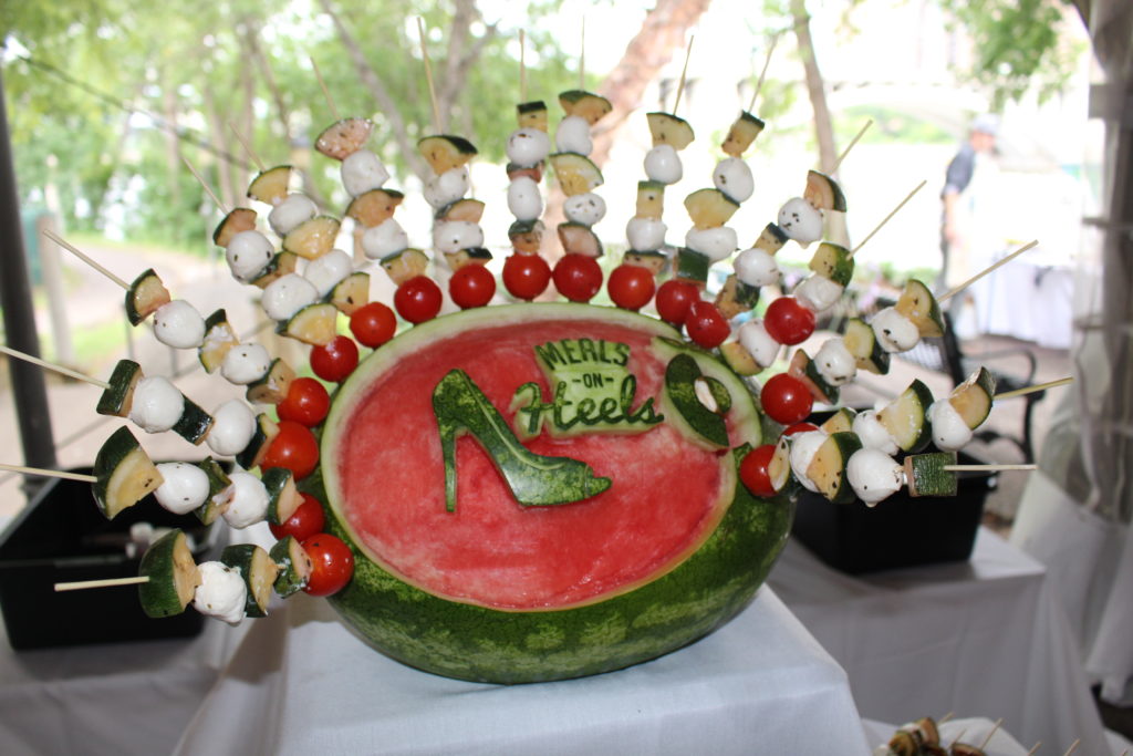 A "Meals on Heels" engraved watermelon