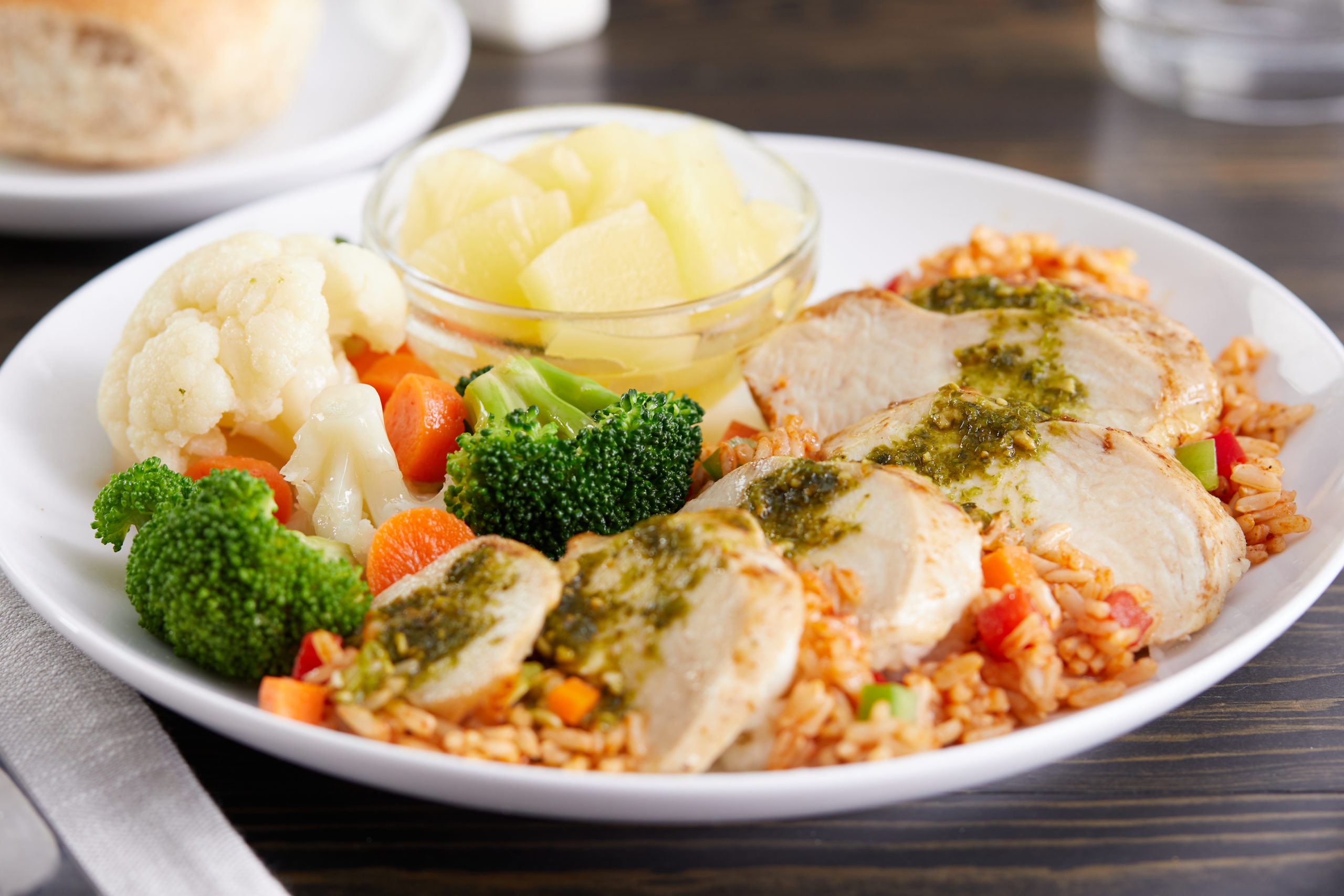 Cilantro Chicken over rice with veggies and fruit