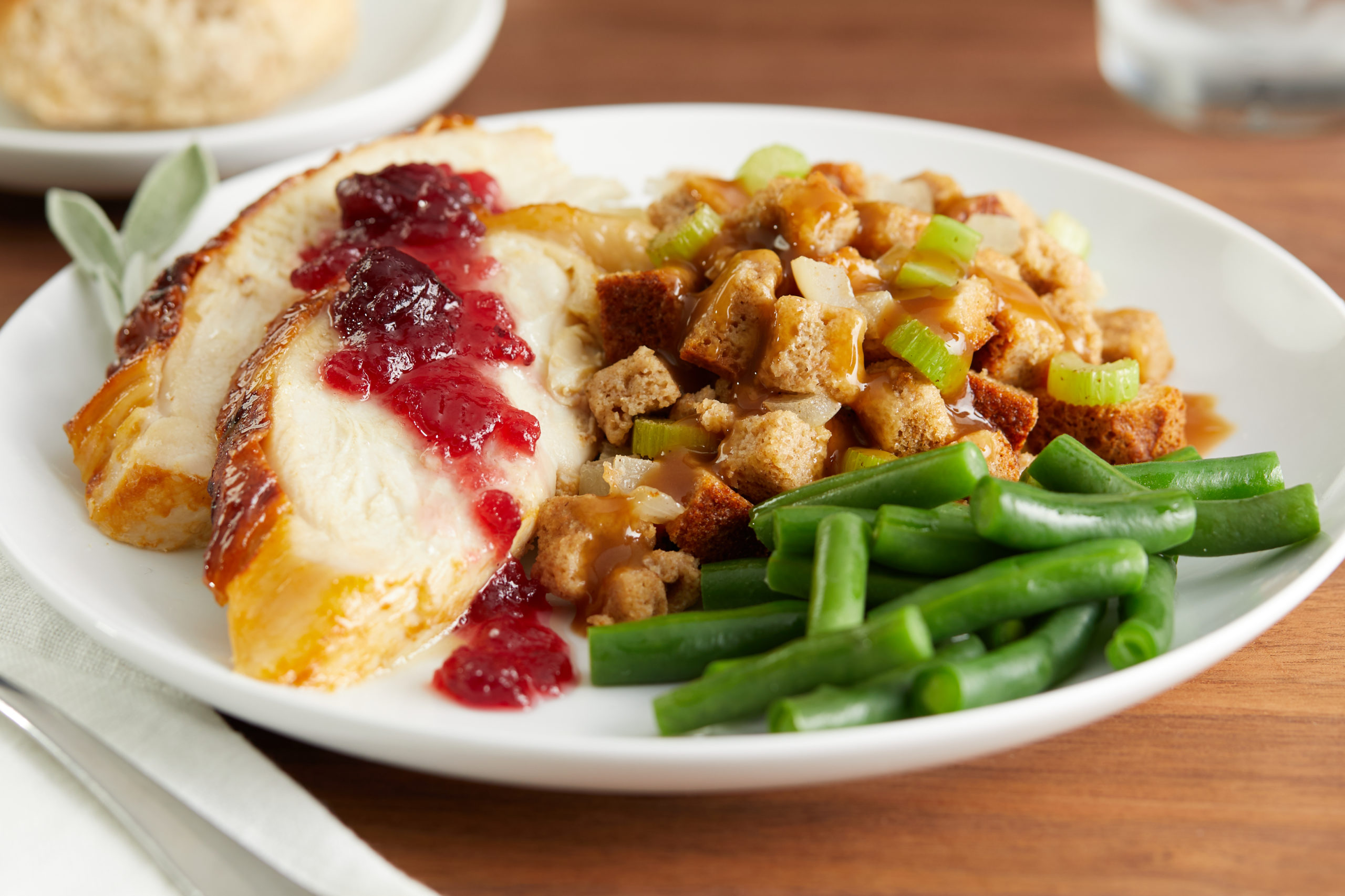 Roast turkey dinner with green beans and stuffing