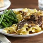 Salisbury steak over noodles with greenbeans