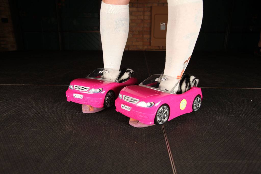 Pink Barbie cars being worn as shoes